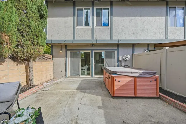 a front view of a house with large windows