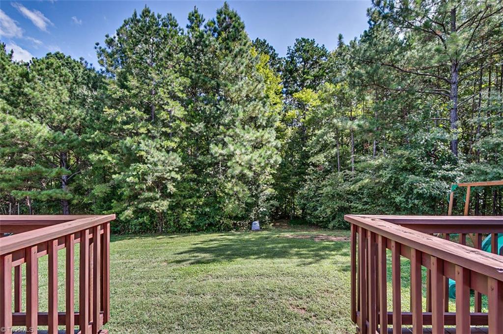 2509 Danny Bell Road Asheboro, NC 27205 - Photo 23 of 27 LARGE deck with steps in middle to access back yard