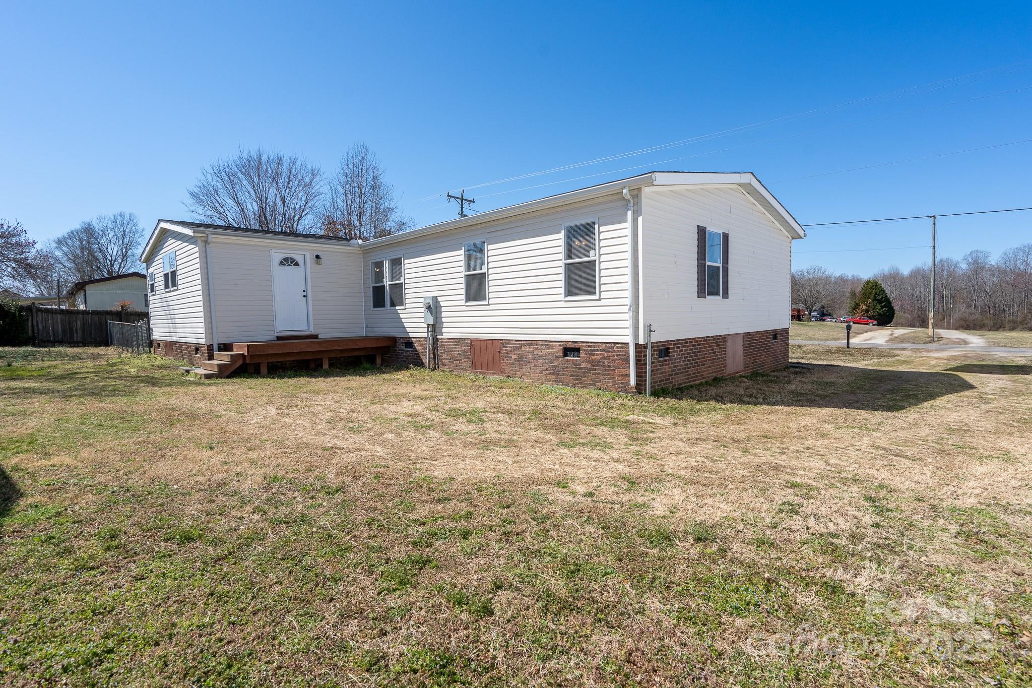 7536 Beaver Road Kannapolis, NC 28081 - Photo 36 of 41 a view of a house with backyard and trees