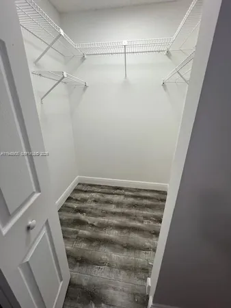 a view of a room with racks on the wall