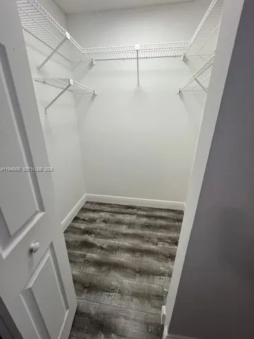 a view of a room with racks on the wall