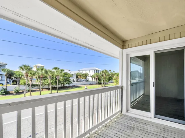 a view of a street from a balcony
