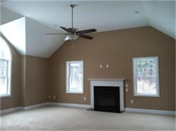 33 Beechnut Road Dracut, MA 01826 - Photo 20 of 30 an empty room with windows and fireplace