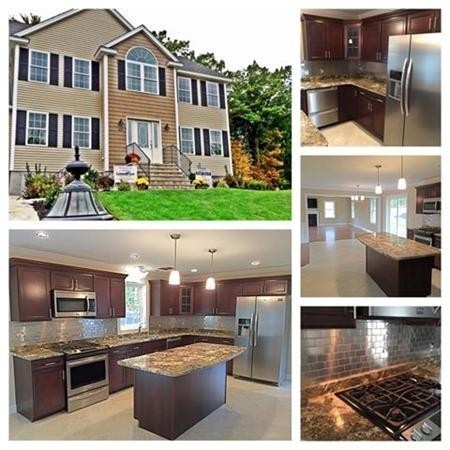 33 Beechnut Road Dracut, MA 01826 - Photo 2 of 30 a view of a kitchen with a sink and a stove