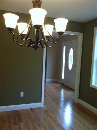 33 Beechnut Road Dracut, MA 01826 - Photo 26 of 30 a view of a livingroom with wooden floor
