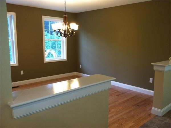33 Beechnut Road Dracut, MA 01826 - Photo 27 of 30 a view of a room that has a window and wooden floor