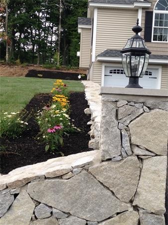 33 Beechnut Road Dracut, MA 01826 - Photo 30 of 30 a front view of a house with garden