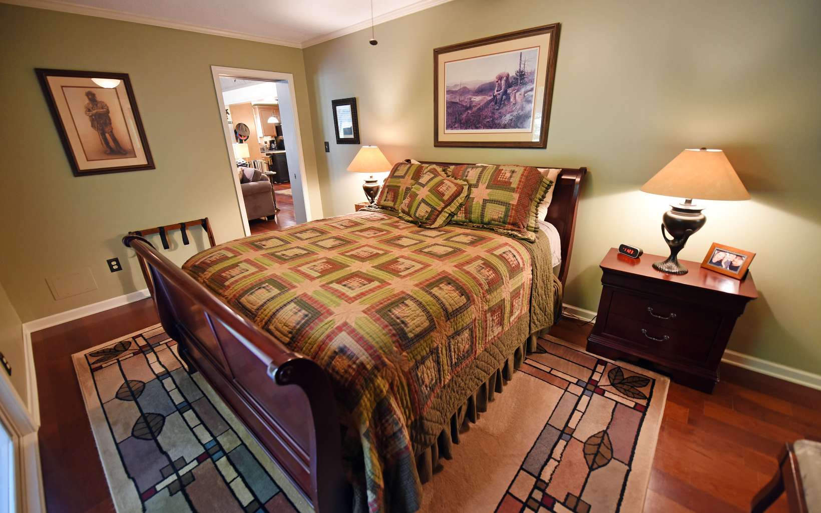 2261 Grape Creek Road Murphy, NC 28906 - Photo 54 of 62 a bedroom with a bed and wooden floor