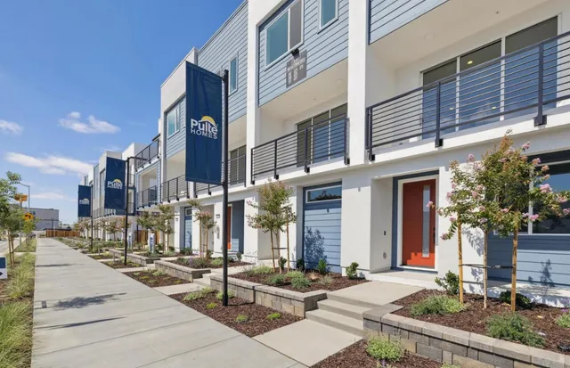 a front view of a building with street view