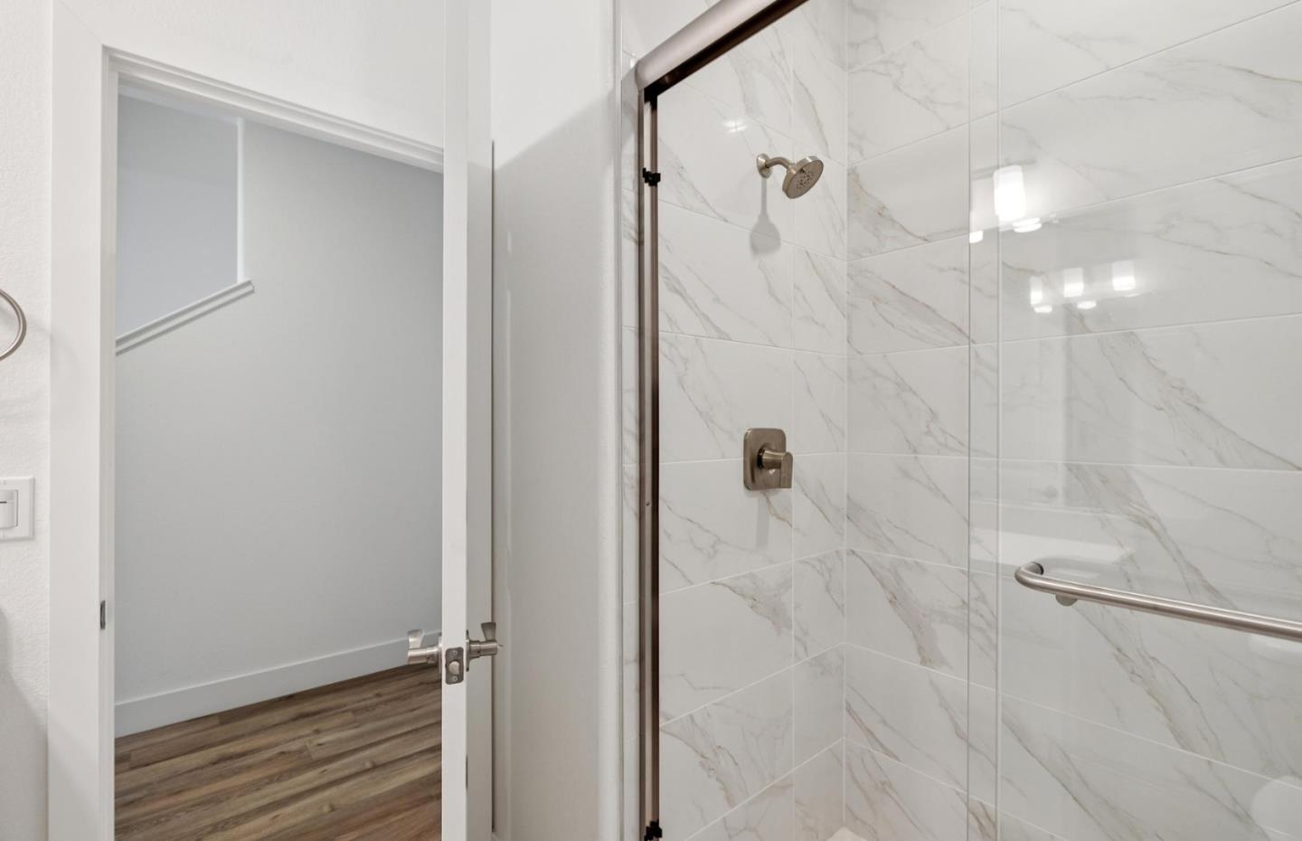 1375 California Circle Milpitas, CA 95035 - Photo 15 of 47 a bathroom with a shower