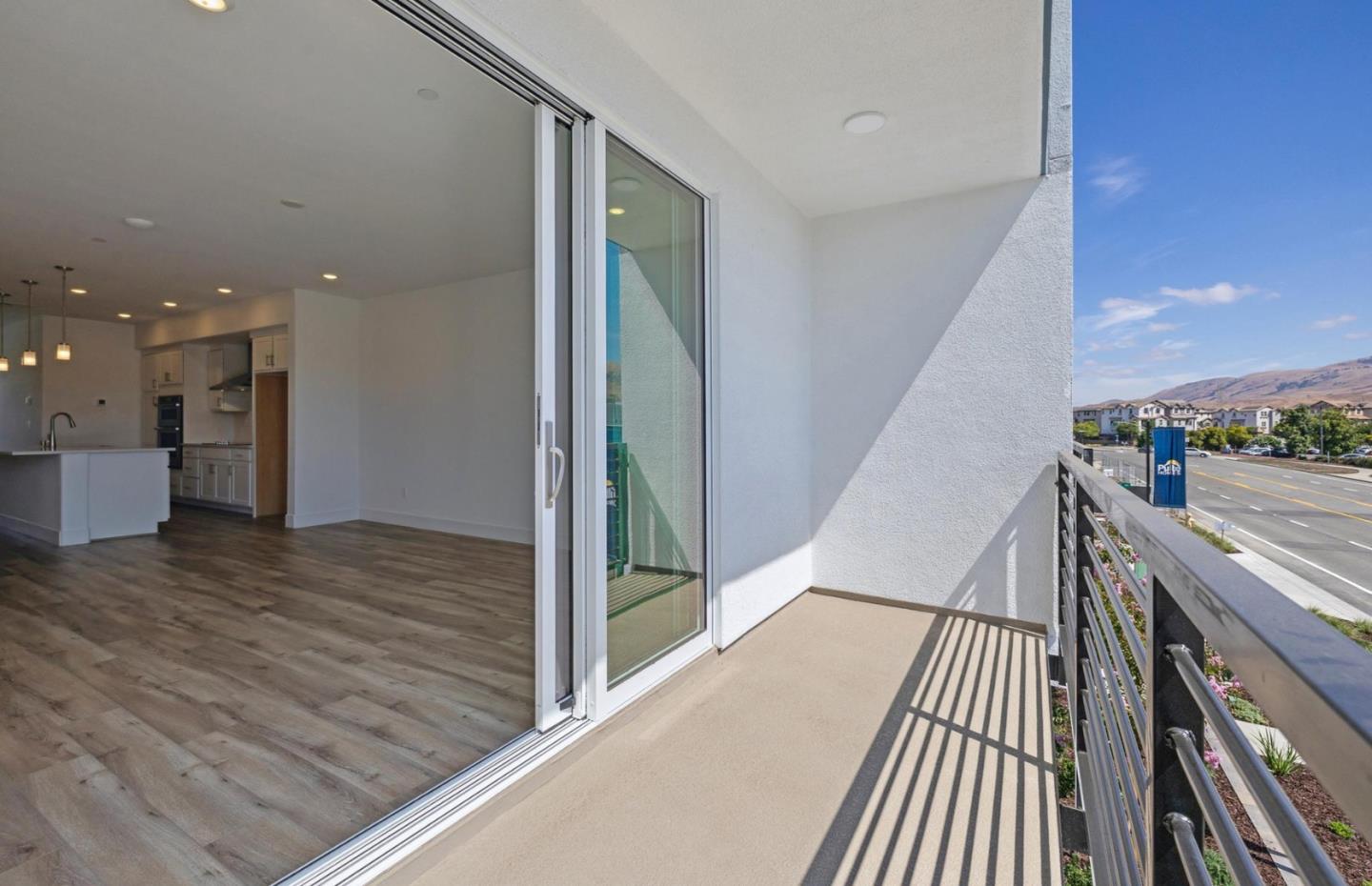 1375 California Circle Milpitas, CA 95035 - Photo 38 of 47 a view of balcony with wooden floor
