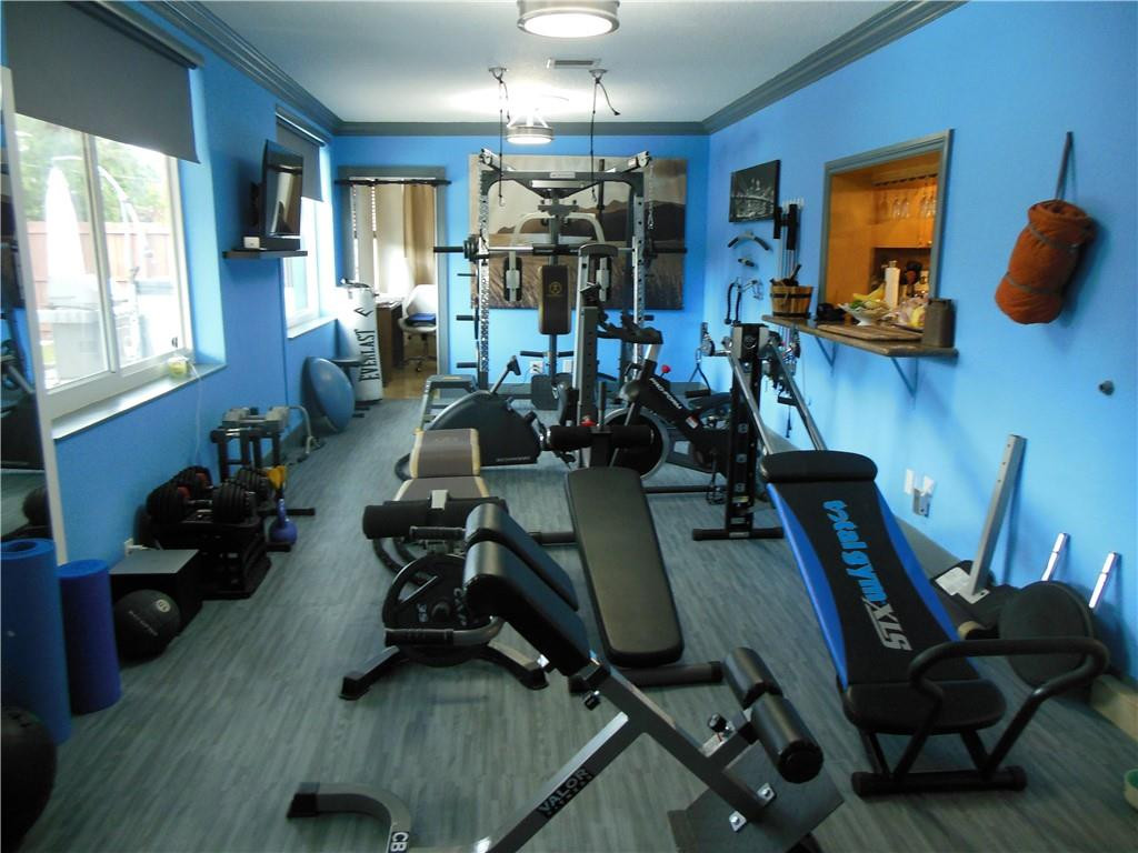 4225 Jackson Street Hollywood, FL 33021 - Photo 23 of 25 a view of a room with gym equipment