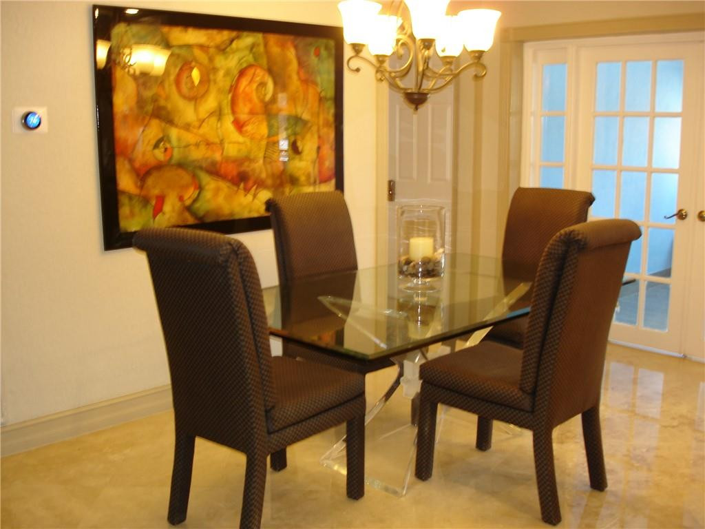 4225 Jackson Street Hollywood, FL 33021 - Photo 8 of 25 a view of a dining room with furniture and a window