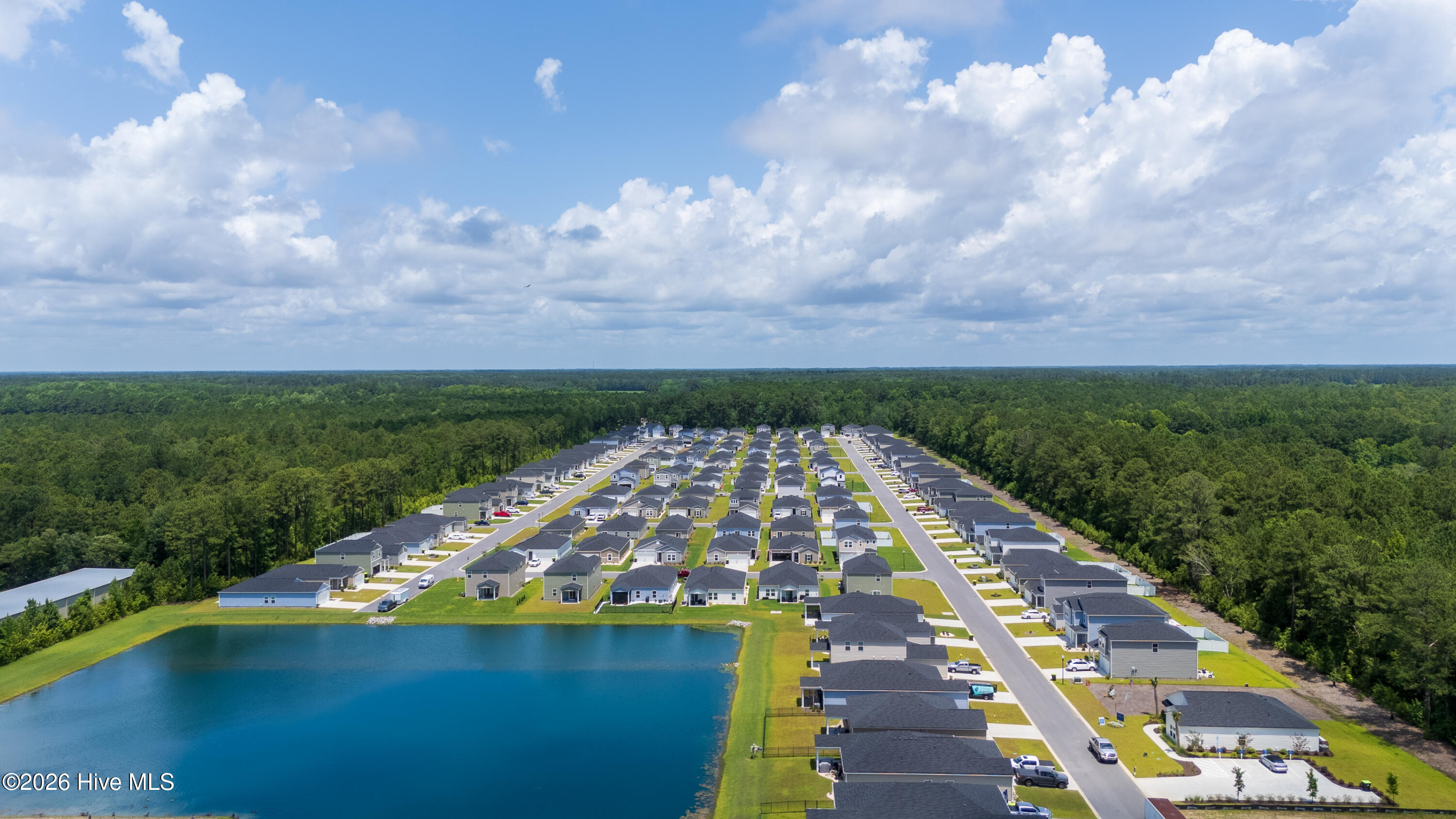 230 Ladyfish Loop Northwest Sunset Beach, NC 28468 - Photo 19 of 19 DJI_20250611123502_0020_D