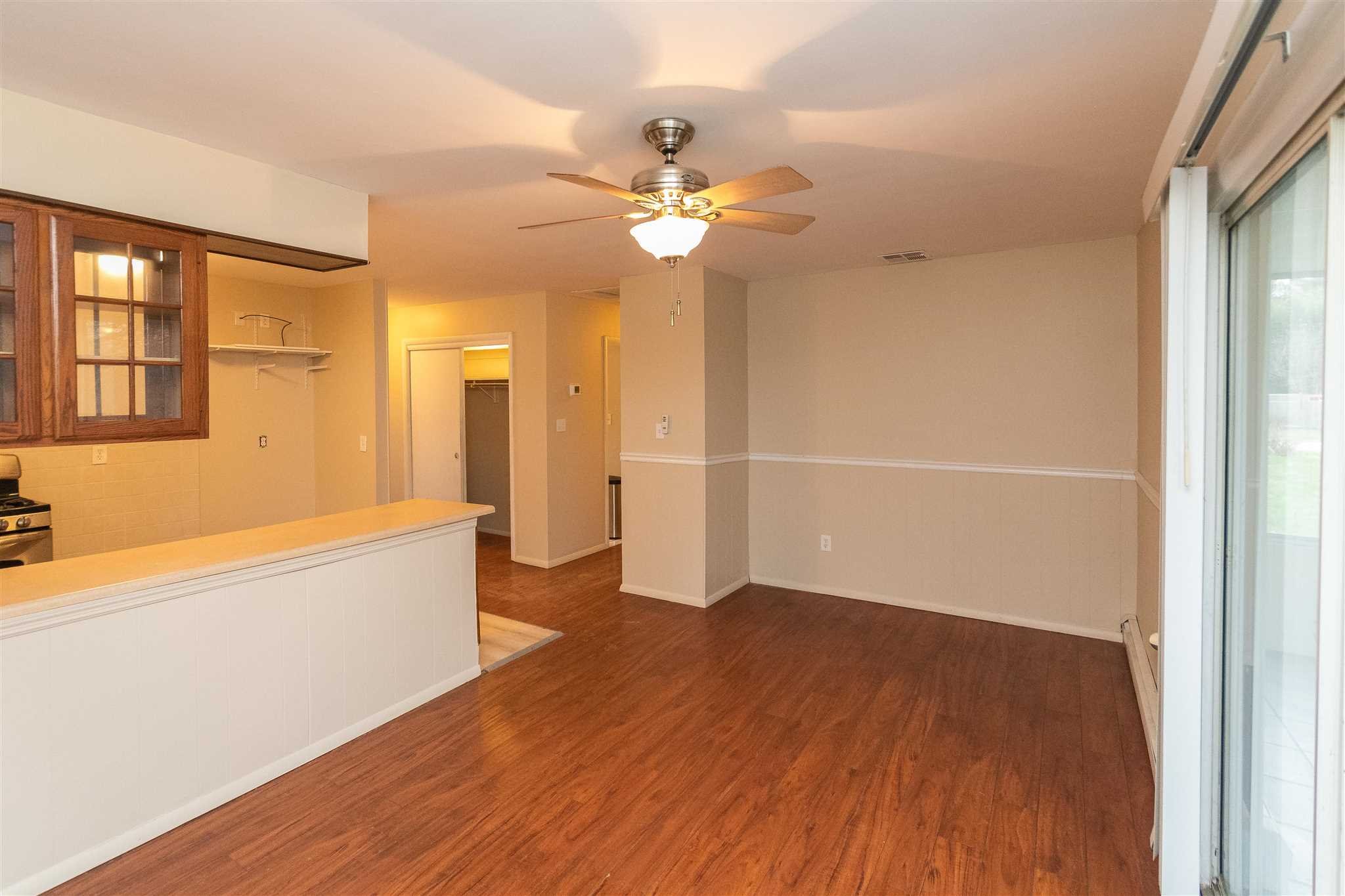 6 McGrath Terrace Fishkill, NY 12524 - Photo 15 of 38 wooden floor in an empty room with a window