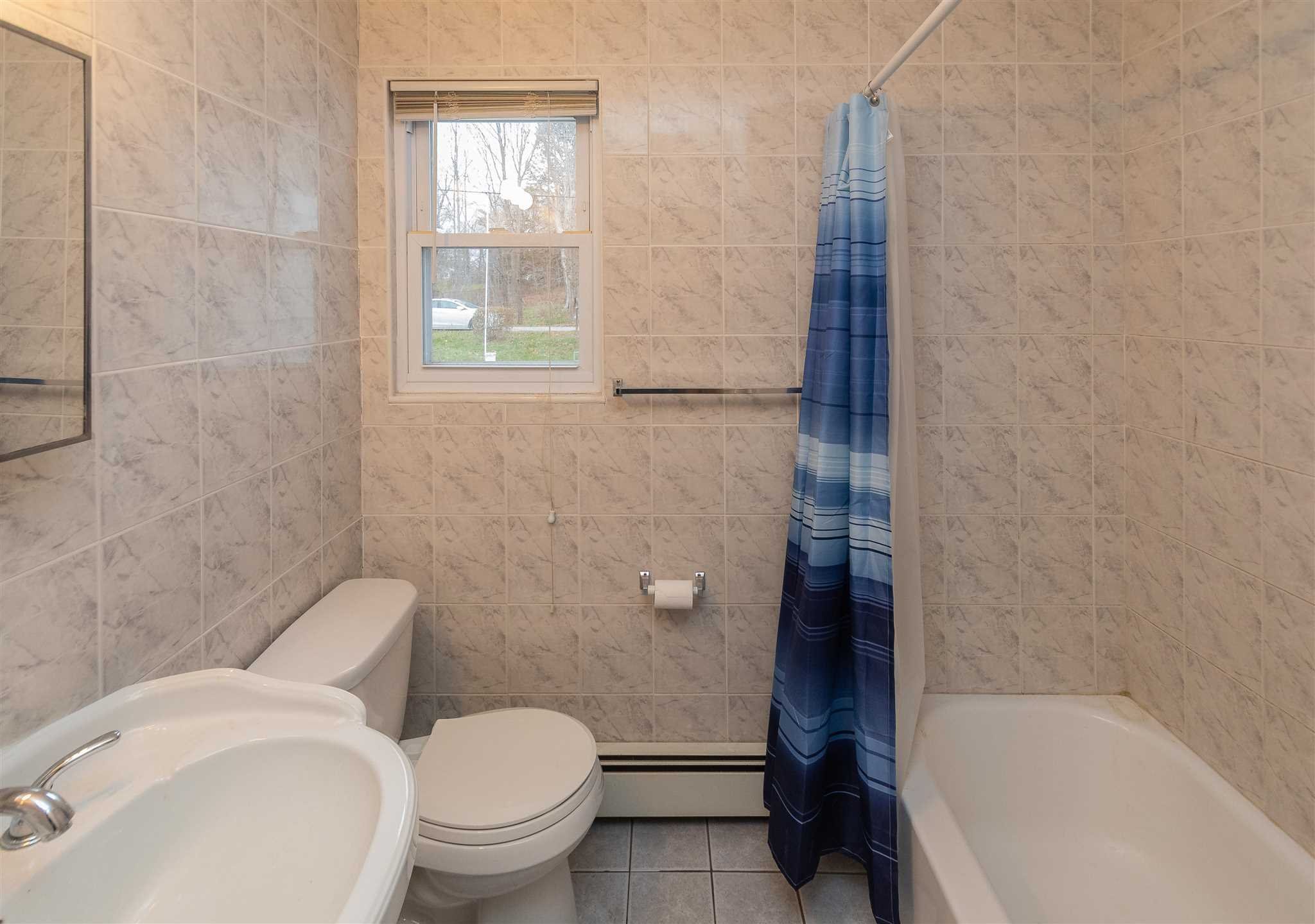 6 McGrath Terrace Fishkill, NY 12524 - Photo 23 of 38 a bathroom with a toilet and a bathtub