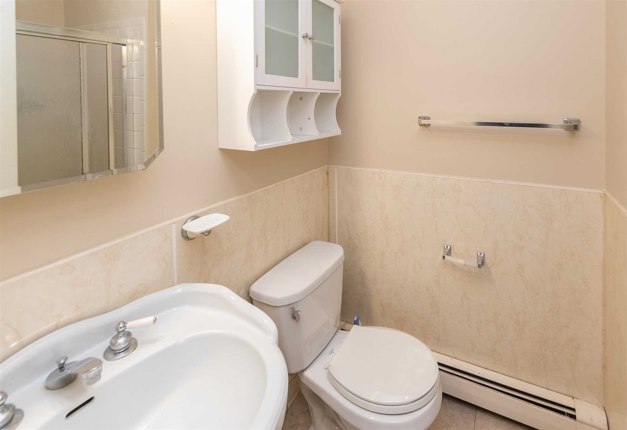 6 McGrath Terrace Fishkill, NY 12524 - Photo 30 of 38 a white toilet sitting next to a bathroom sink