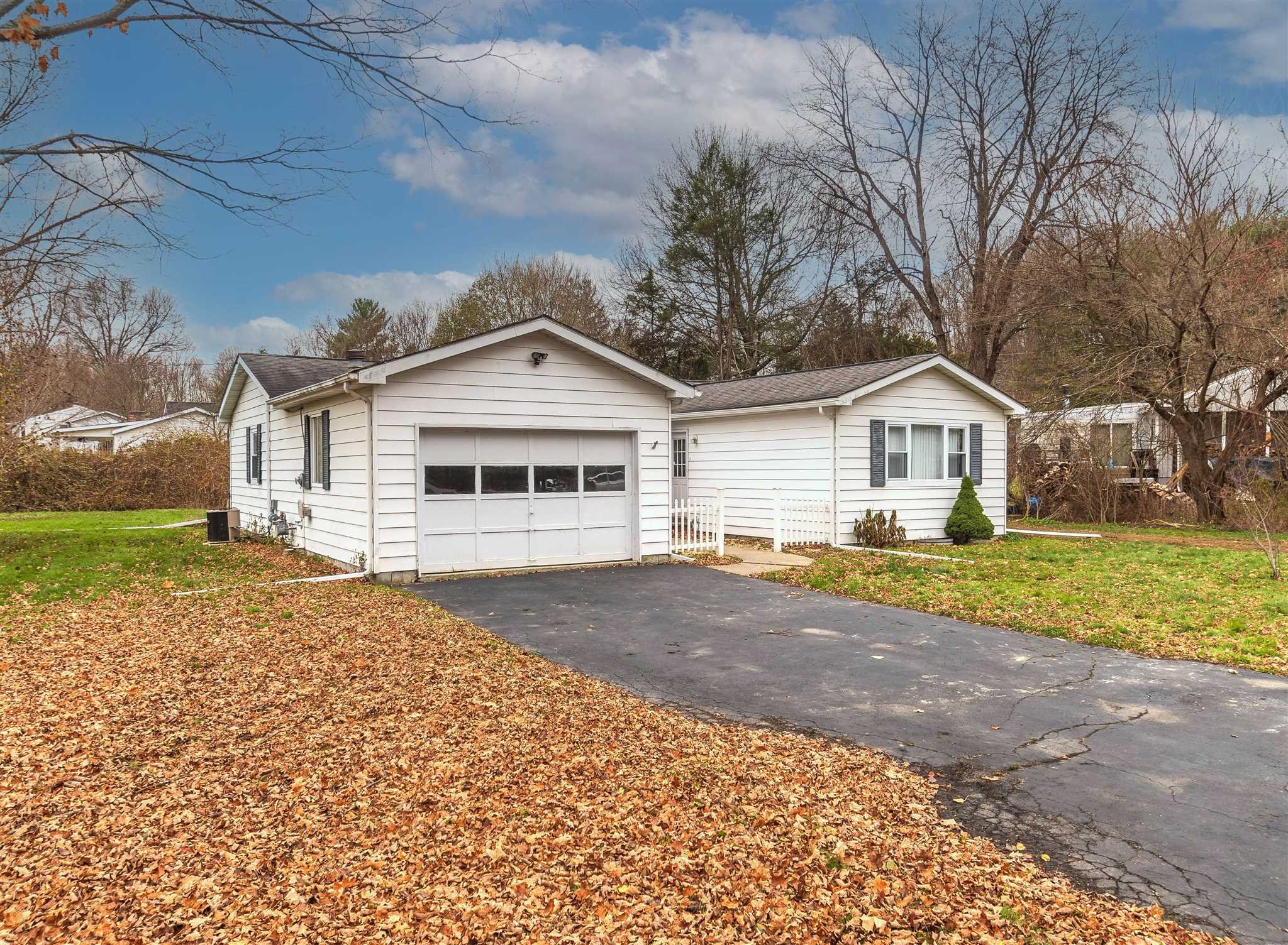 6 McGrath Terrace Fishkill, NY 12524 - Photo 3 of 38 a front view of a house with a yard and garage