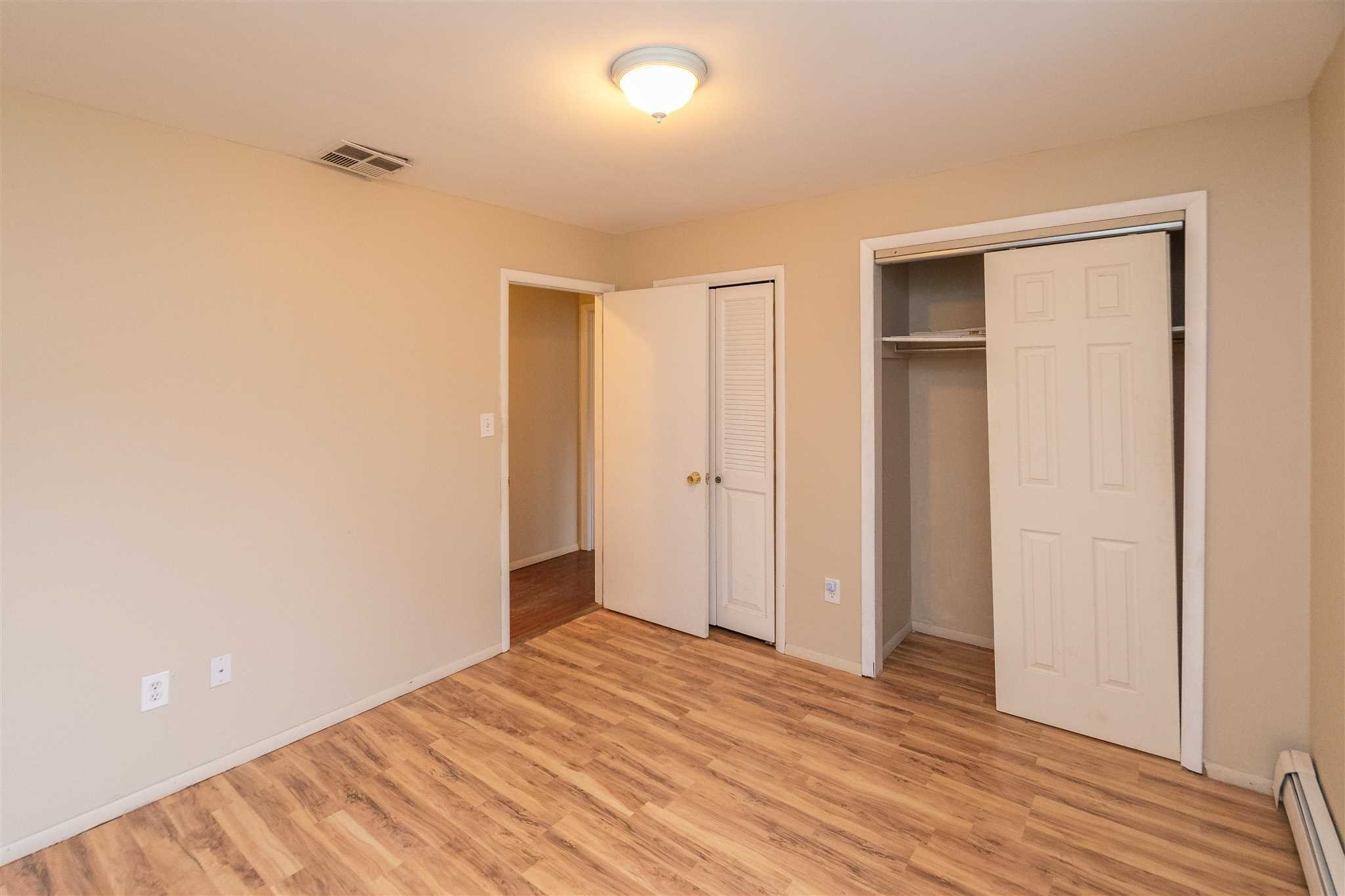 6 McGrath Terrace Fishkill, NY 12524 - Photo 31 of 38 a view of empty room with wooden floor