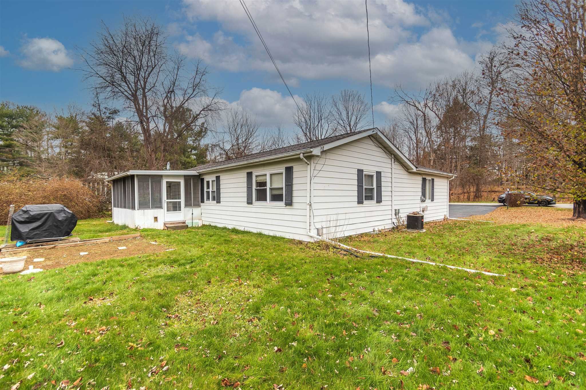 6 McGrath Terrace Fishkill, NY 12524 - Photo 5 of 38 a view of a house with a yard and chairs