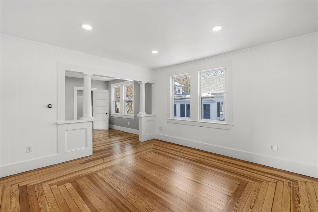 2 Oakdale Street Wareham, MA 02571 - Photo 11 of 33 wooden floor in an empty room with a window