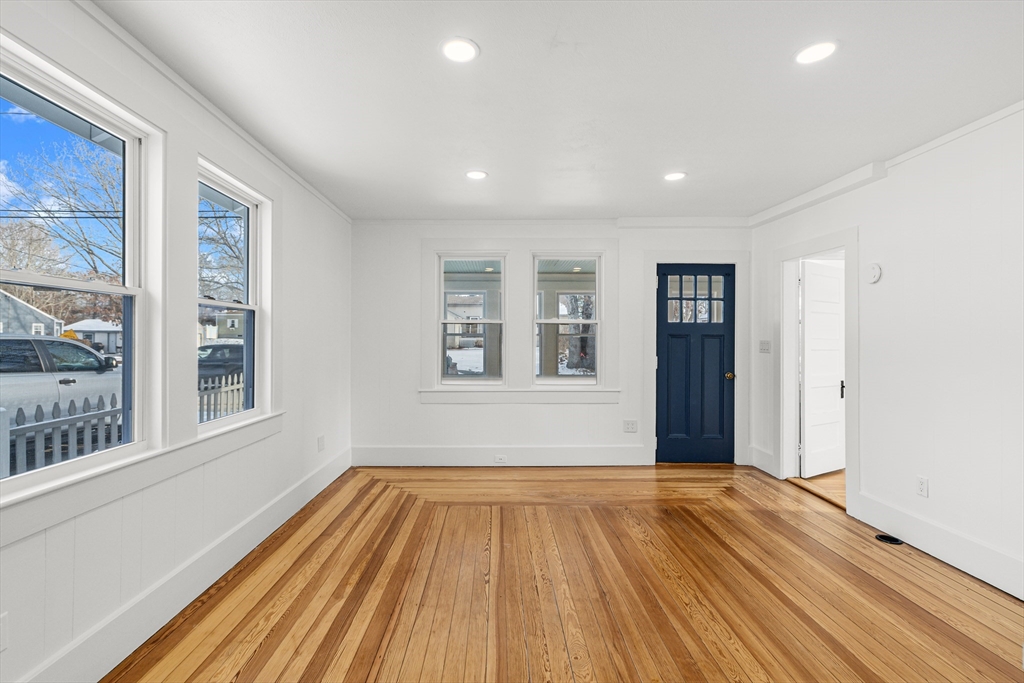 2 Oakdale Street Wareham, MA 02571 - Photo 13 of 33 a view of an empty room with wooden floor and a window