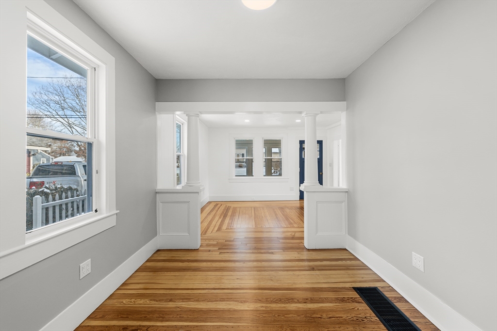 2 Oakdale Street Wareham, MA 02571 - Photo 14 of 33 a view of empty room with wooden floor and fan