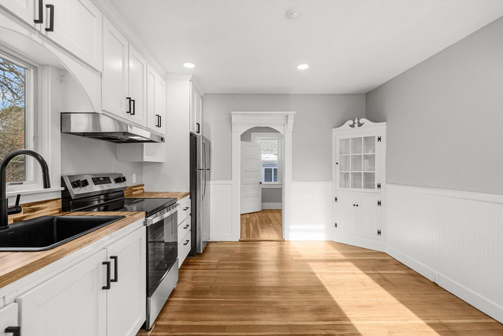 2 Oakdale Street Wareham, MA 02571 - Photo 22 of 33 a kitchen with stainless steel appliances a sink stove and cabinets