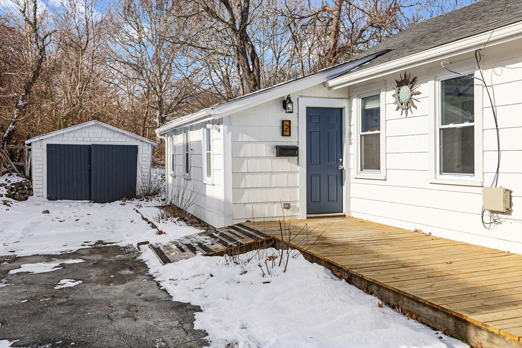 2 Oakdale Street Wareham, MA 02571 - Photo 30 of 33 a view of a backyard with a large tree