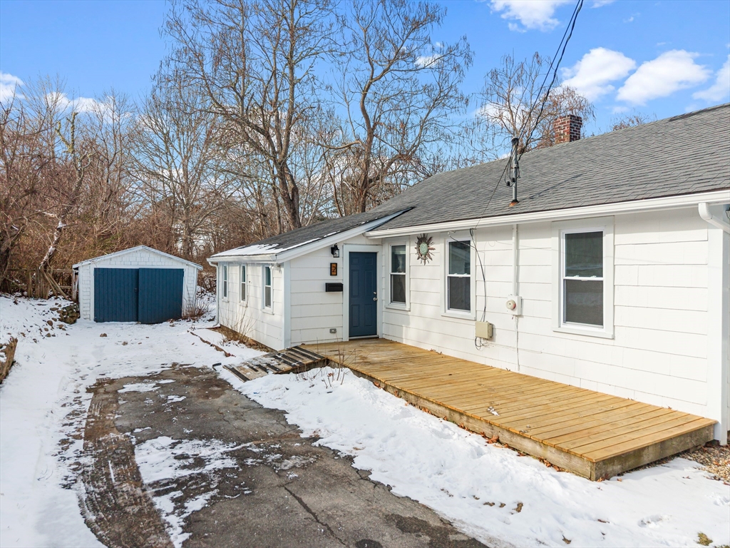2 Oakdale Street Wareham, MA 02571 - Photo 3 of 33 a view of a house with snow on the road