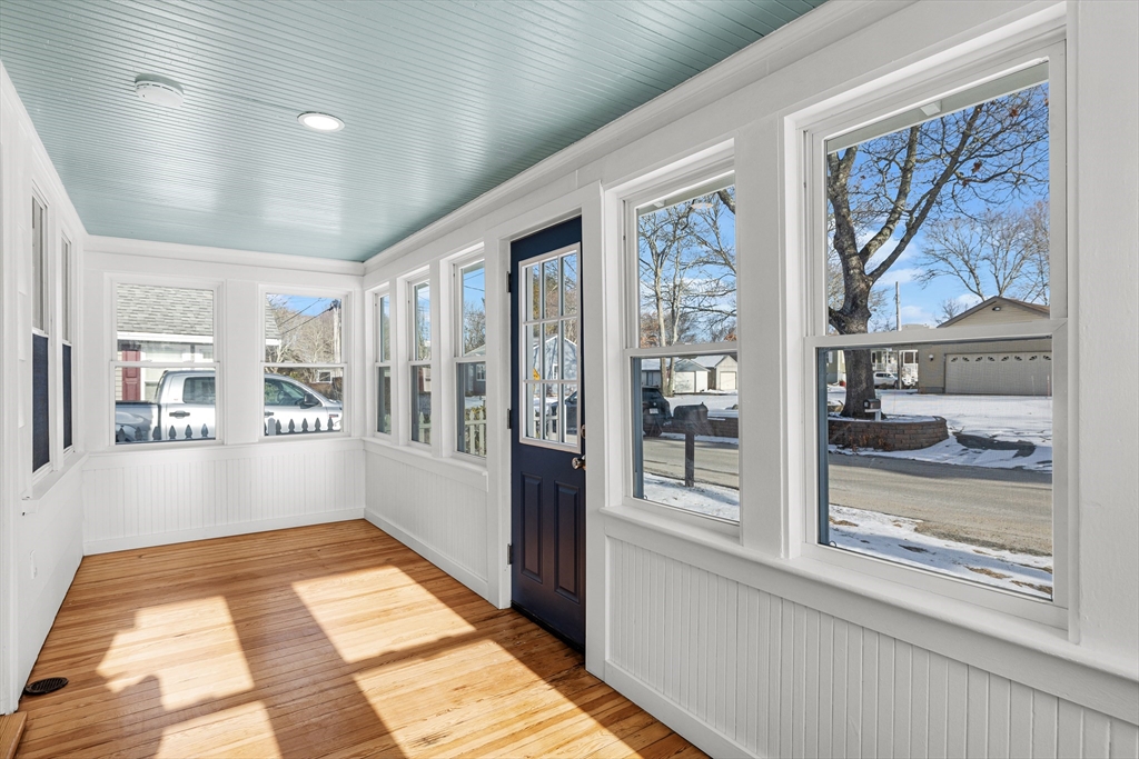 2 Oakdale Street Wareham, MA 02571 - Photo 6 of 33 a hallway with wooden floor and a rug