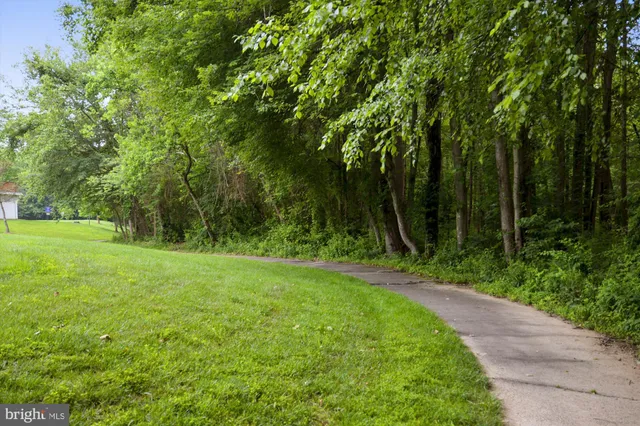 a front view of a building with seating space