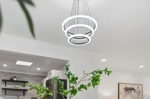 a kitchen with stainless steel appliances a sink dishwasher stove microwave and cabinets