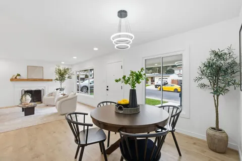 a kitchen with a sink dishwasher and cabinets