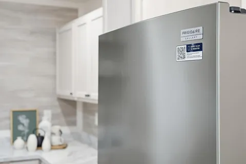 a view of living room with furniture and potted plant