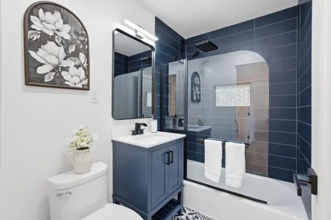 a front view of a house with a yard and table and chairs