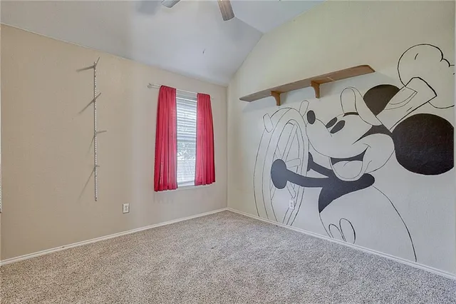 a view of a room with window and tub