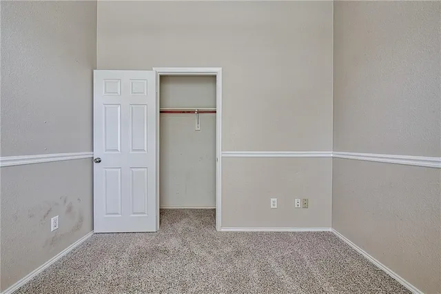an empty room with closet