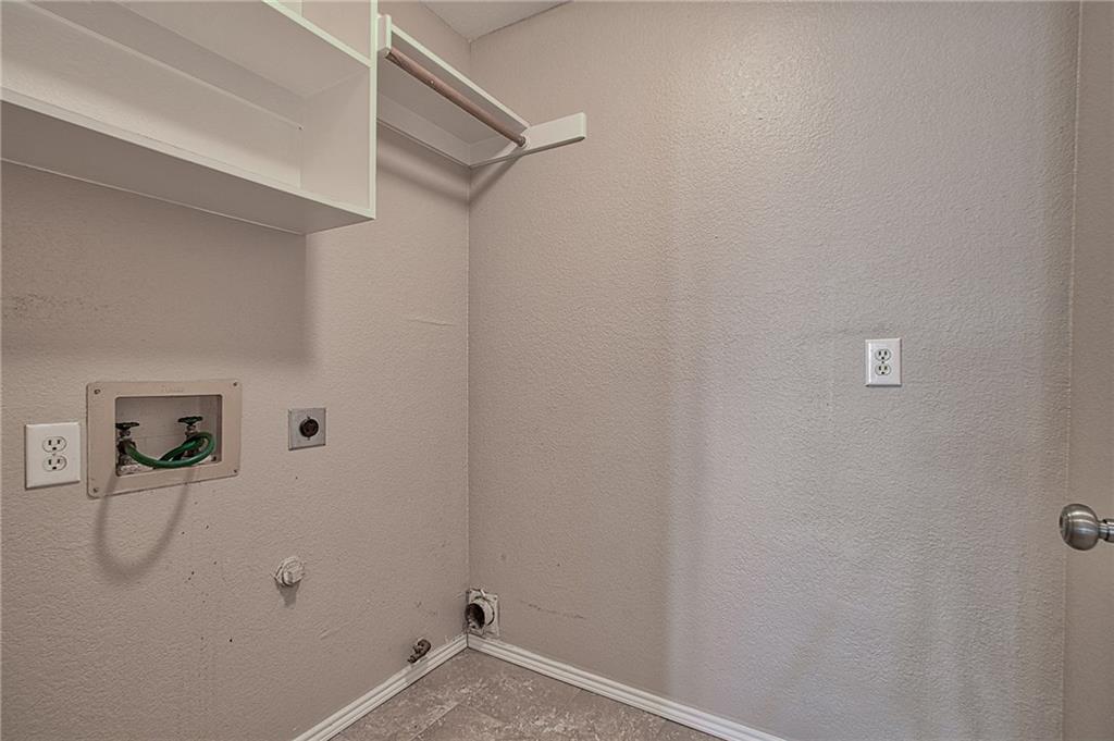 404 Faircloud Lane McKinney, TX 75072 - Photo 23 of 26 a view of a room with rack on the wall