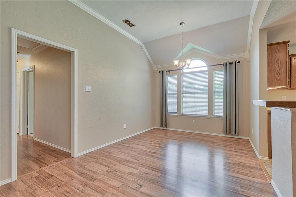 404 Faircloud Lane McKinney, TX 75072 - Photo 5 of 26 a view of empty room with wooden floor and fan