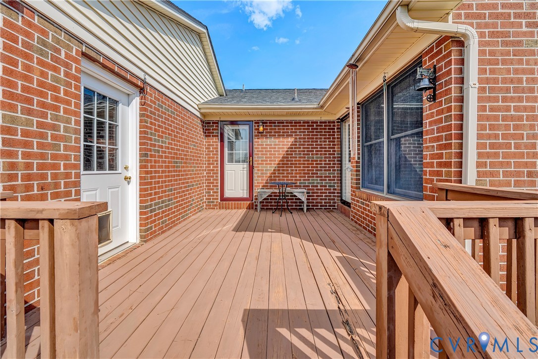 258 Willow Oak Road Appomattox, VA 24522 - Photo 44 of 50 Expansive wood-finish deck with wood railings, bri