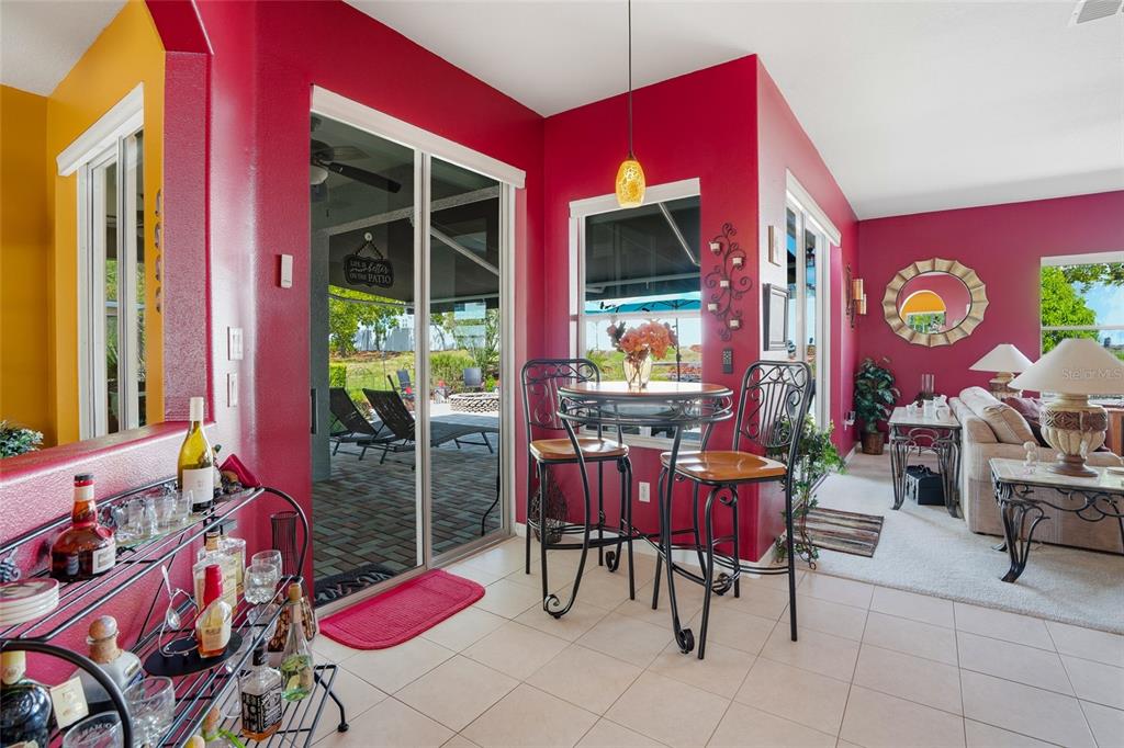 4154 Braemere Drive Spring Hill, FL 34609 - Photo 16 of 95 a view of dinning table and chairs in the patio