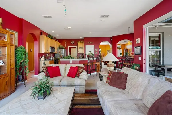 a view of a dining room with furniture wooden floor and balcony
