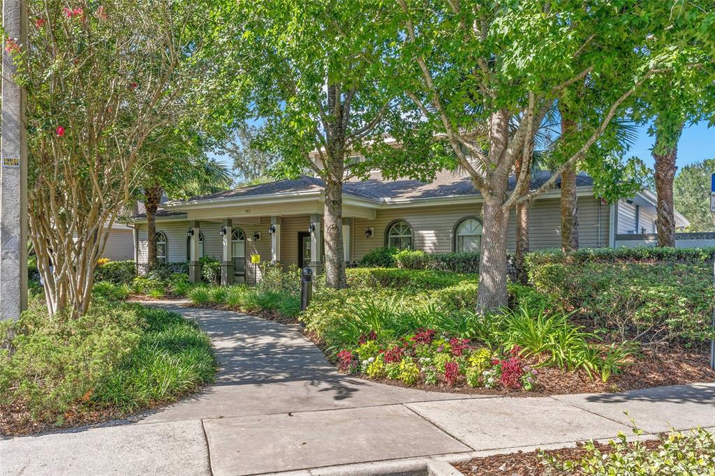 4154 Braemere Drive Spring Hill, FL 34609 - Photo 48 of 95 a front view of a house with a garden