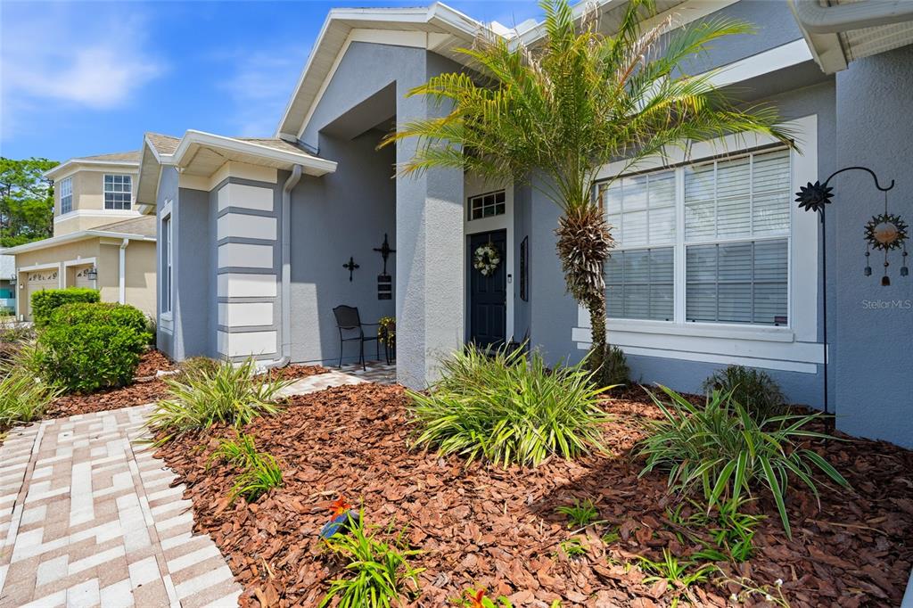 4154 Braemere Drive Spring Hill, FL 34609 - Photo 5 of 95 a front view of a house with a yard