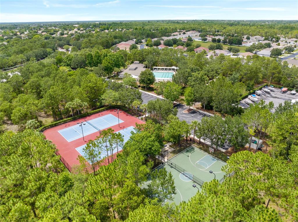 4154 Braemere Drive Spring Hill, FL 34609 - Photo 51 of 95 an aerial view of residential houses with outdoor space and street view