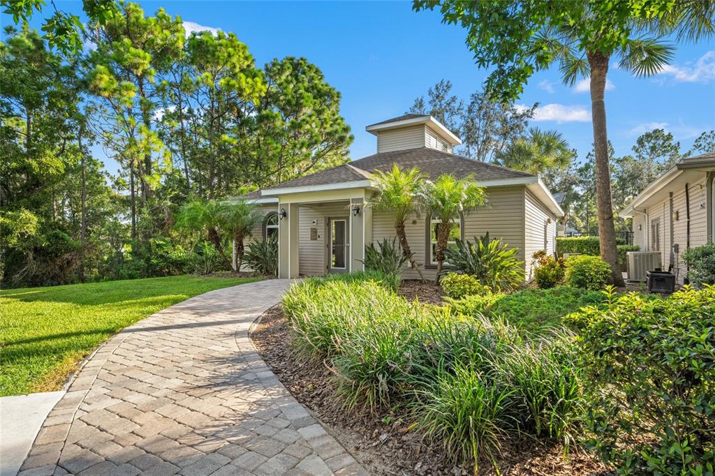 4154 Braemere Drive Spring Hill, FL 34609 - Photo 60 of 95 a front view of a house with a yard