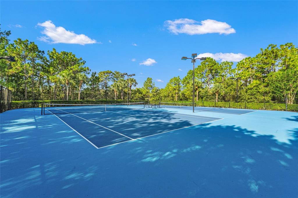 4154 Braemere Drive Spring Hill, FL 34609 - Photo 61 of 95 a view of a tennis court