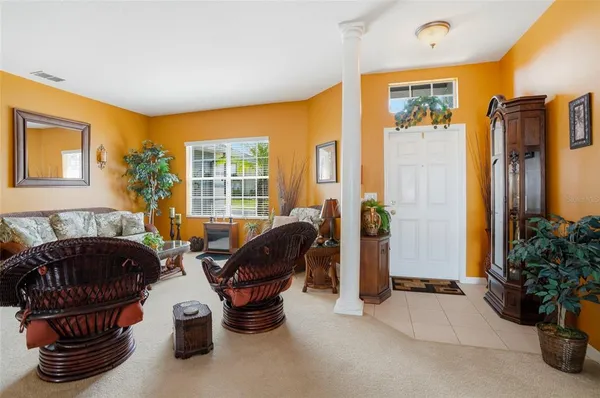 a spacious bedroom with a bed and a window