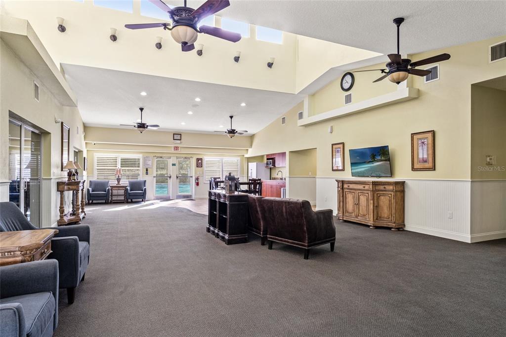 4154 Braemere Drive Spring Hill, FL 34609 - Photo 78 of 95 a view of a livingroom with furniture and a ceiling fan